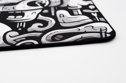 Image of LA ONDA X NACHOCUSTOMZ RIZZ 'DOODLES' Mouse pad showing the bottom right corner of the mouse pad and displaying the sub-surface level stitching.