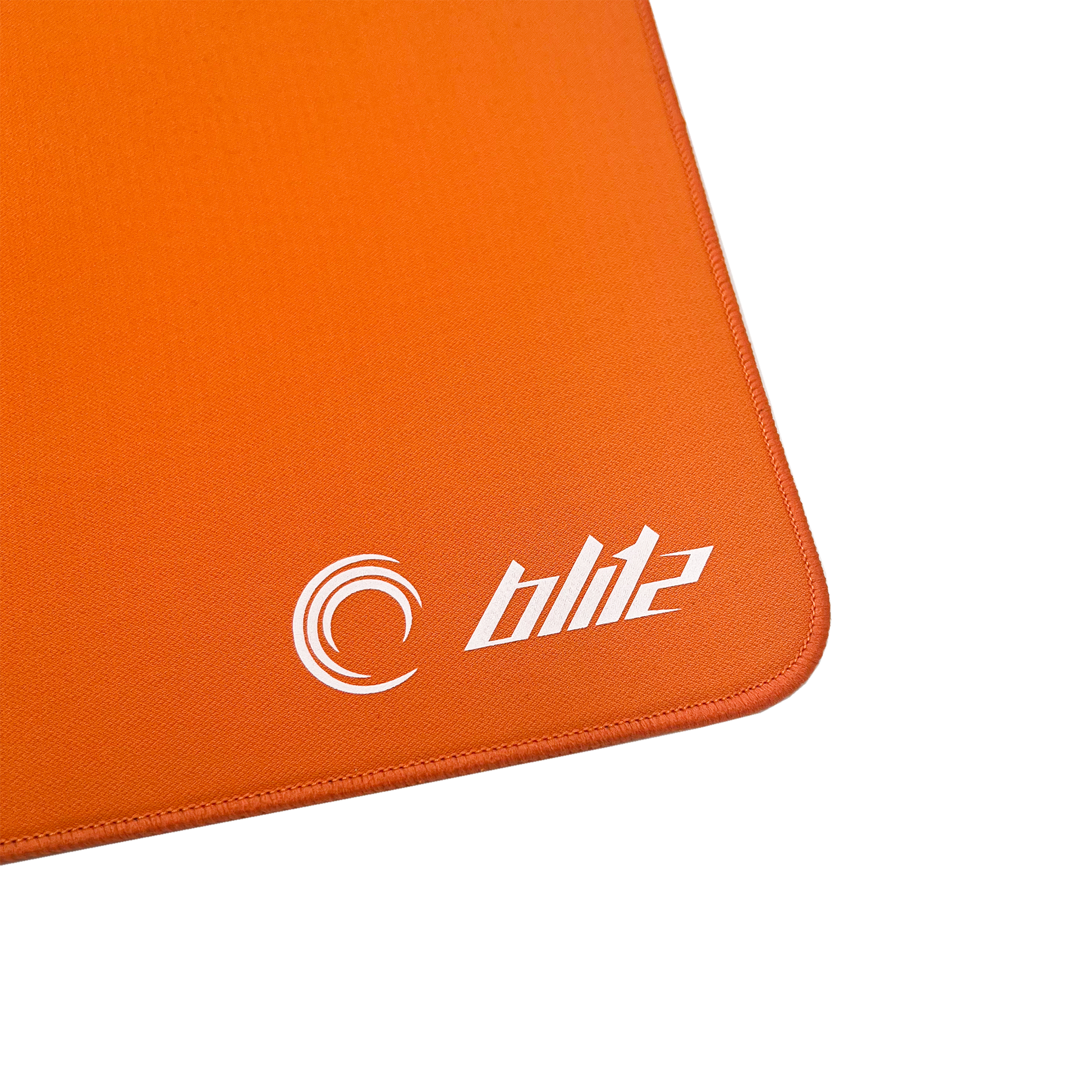 Close up image of the LA ONDA Blitz mouse pad and logo in the colour orange.